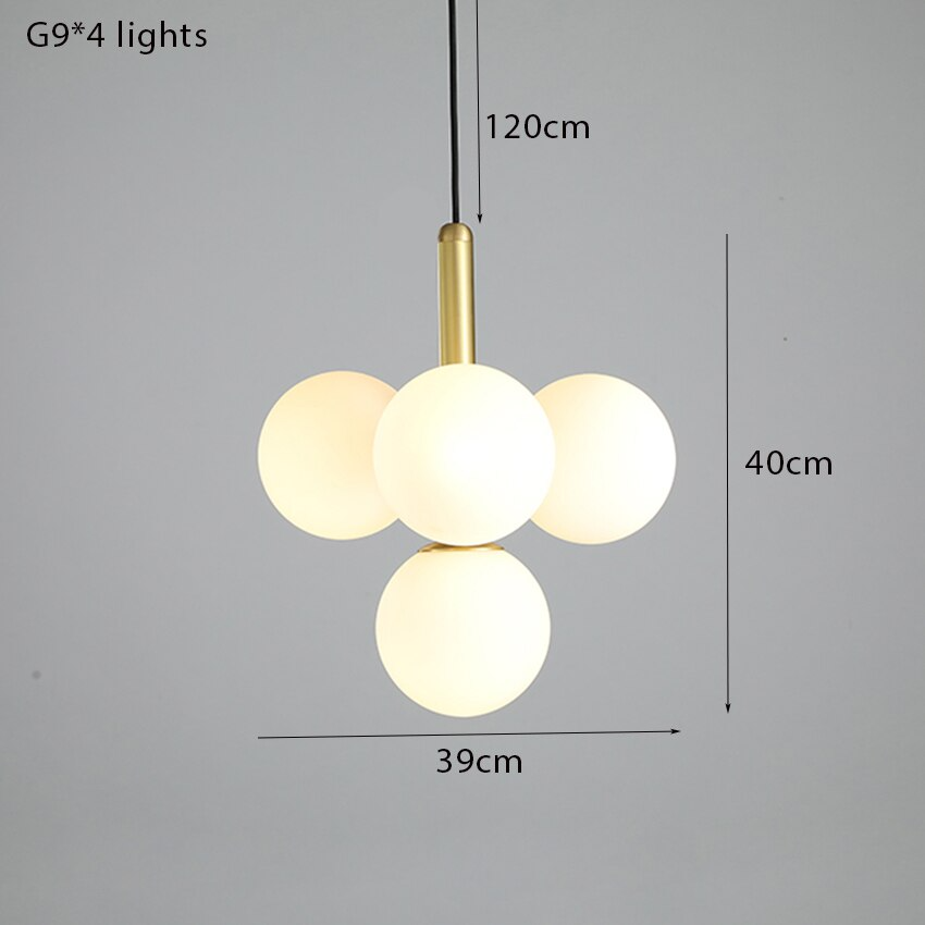 Suspension design laiton 4 sphères verre blanc chic élégant moderne