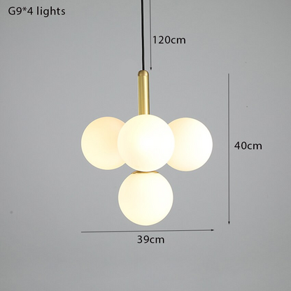 Suspension design laiton 4 sphères verre blanc chic élégant moderne