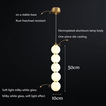 Suspension élégante multi-boules blanches motif doré chic design moderne