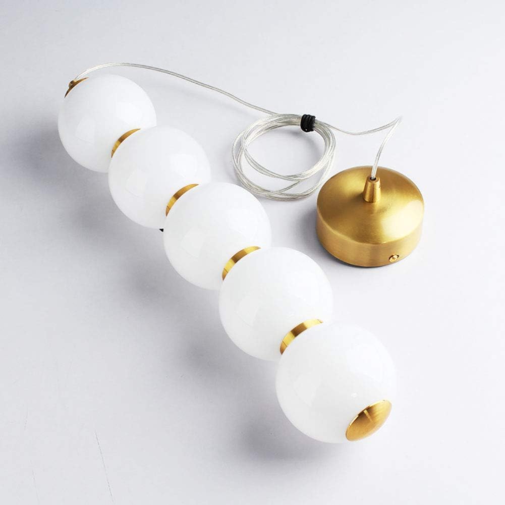 Suspension élégante multi-boules blanches motif doré chic design moderne