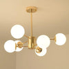Suspension en laiton doré avec 6 globes opalins