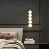 Suspension Oruga 5 Boules Design Moderne – Luminaire Élégant Maroc